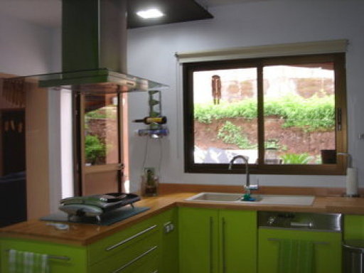 cocina verde y blanca | Decorar tu casa es facilisimo.com