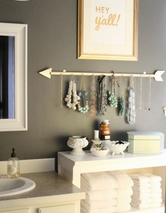 flecha decorativa para organizar accesorios